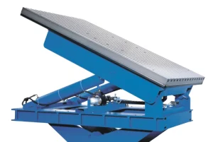 Blue tilt table with metal top.