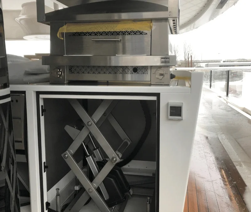Superyacht scissor lift on the yacht deck.