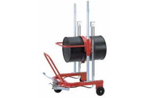 Red barrel handling machine with black barrel in it.